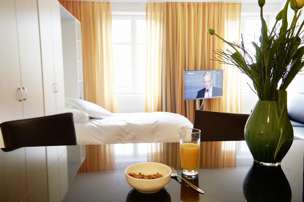 Residence Apartments By Hotel Du Commerce Basileia Quarto foto